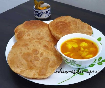 Aloo Poori (1Plate With Raita+8 Poori)